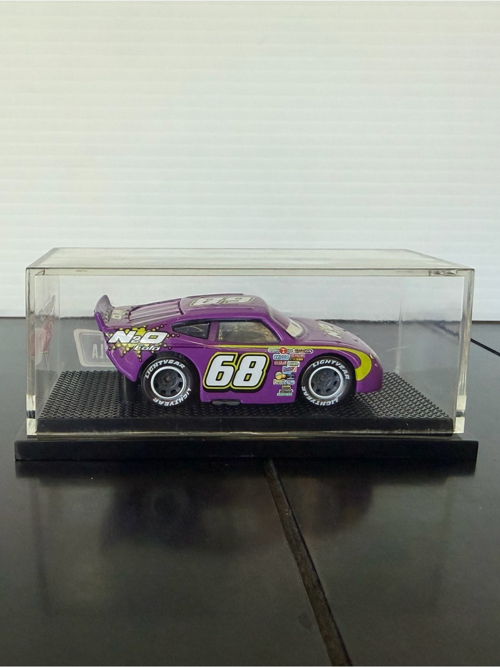 Disney Pixar Cars Manny Flywheel in display case - 1:55 scale (1978EA)